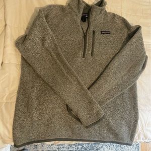 Men’s Patagonia sweater 1/4 zip. In good condition but definitely worn.  large.